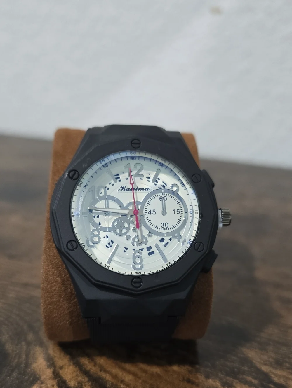 Black Sports Watch with White Skeleton Dial